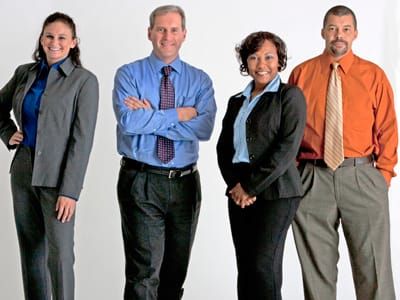 Four volunteers posing for a class